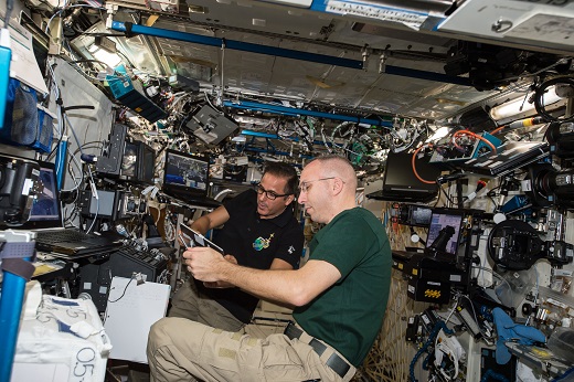 Astronauts Asta and Bresnick in space